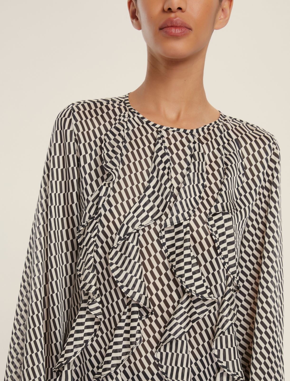 Camicetta in raso fantasia optical