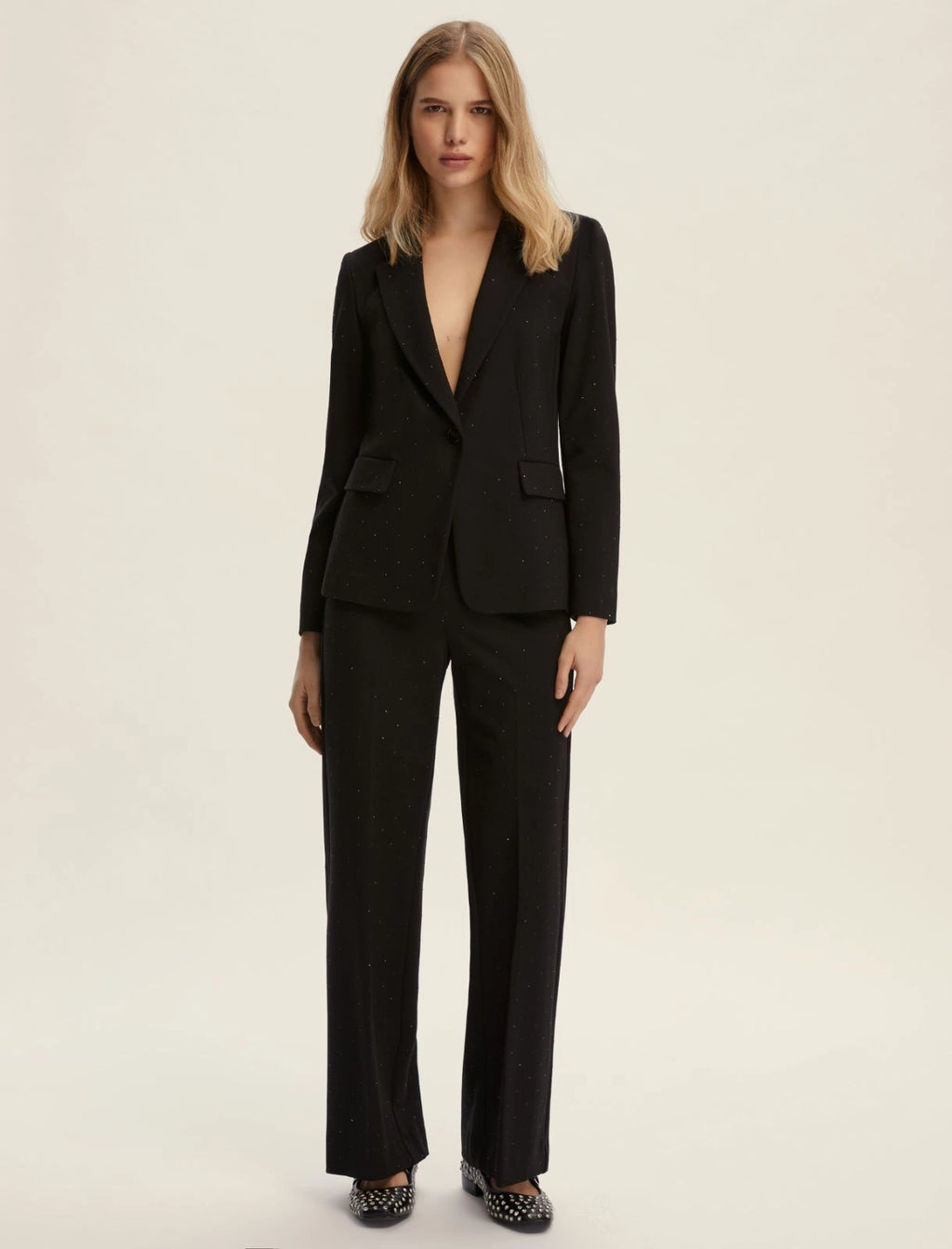 Pantalone con applicazioni POLA