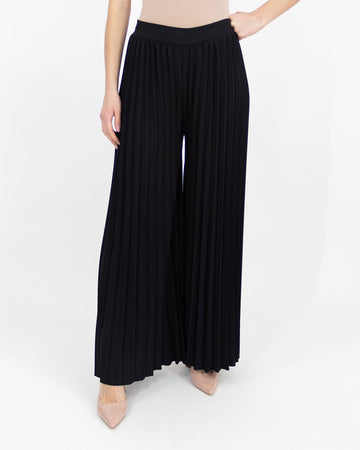 Black trousers with pleats