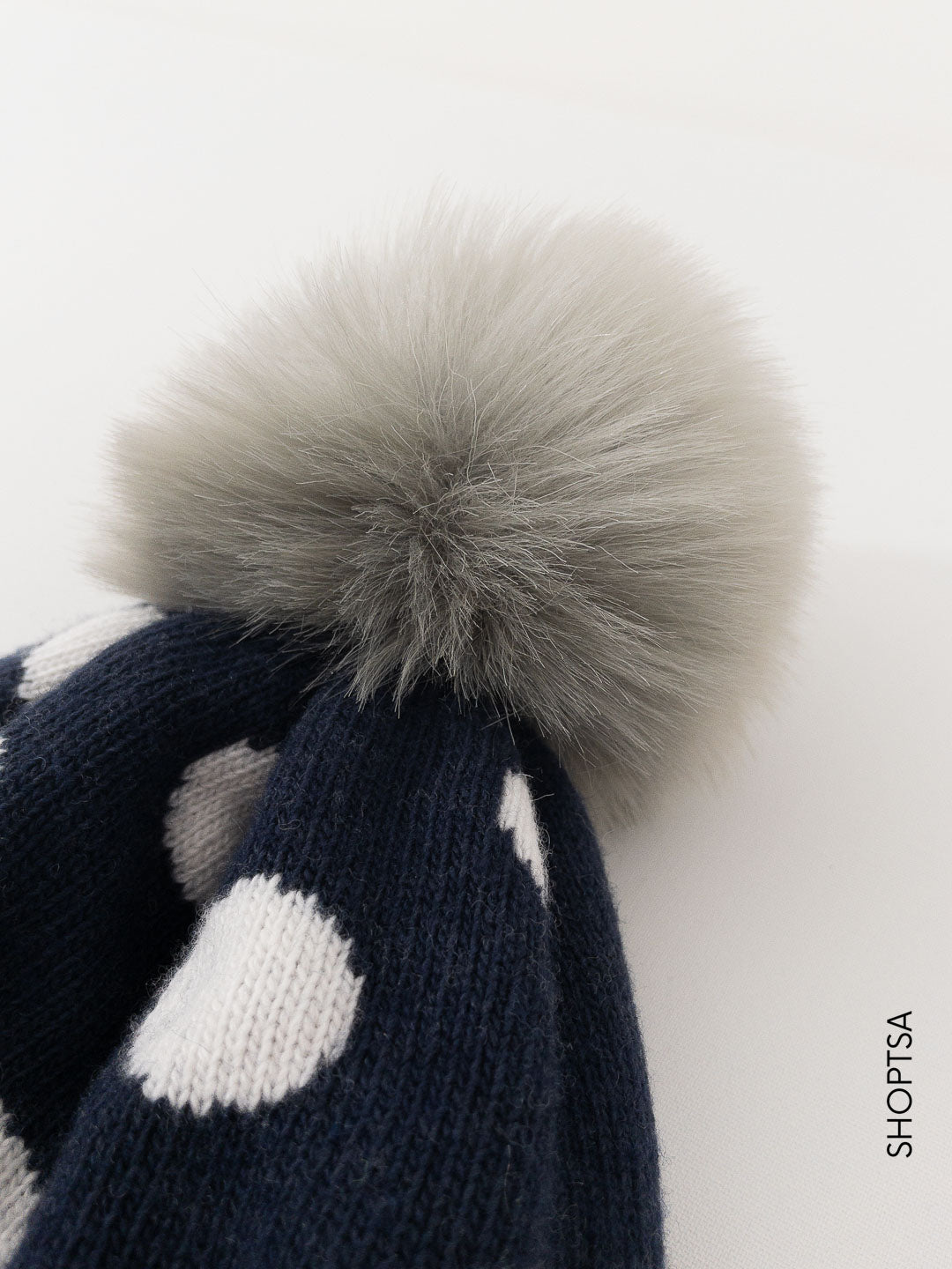 Wool and cashmere pom pom hat