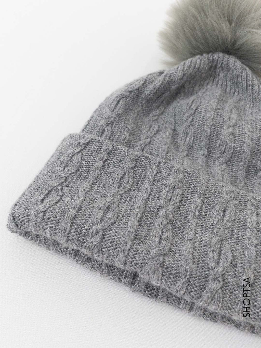 Wool and cashmere pom pom hat