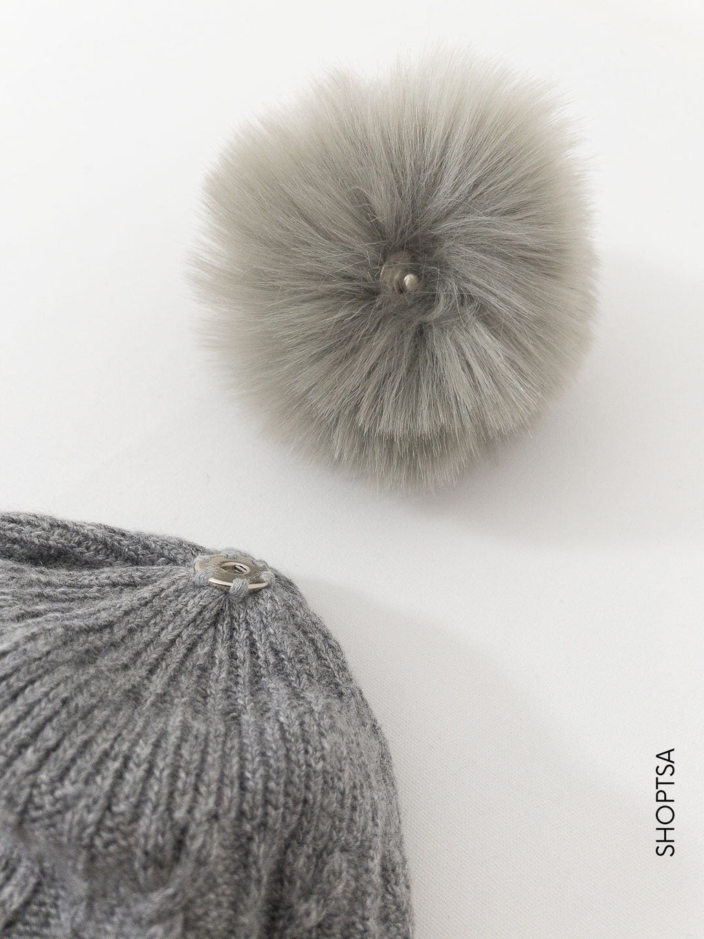 Wool and cashmere pom pom hat